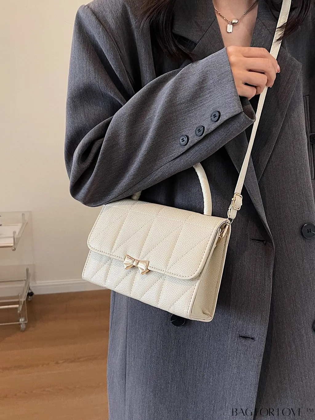 BagForLove - Chic Flap Handbag with Stylish Stitching, Bow Detail, and Adjustable Strap