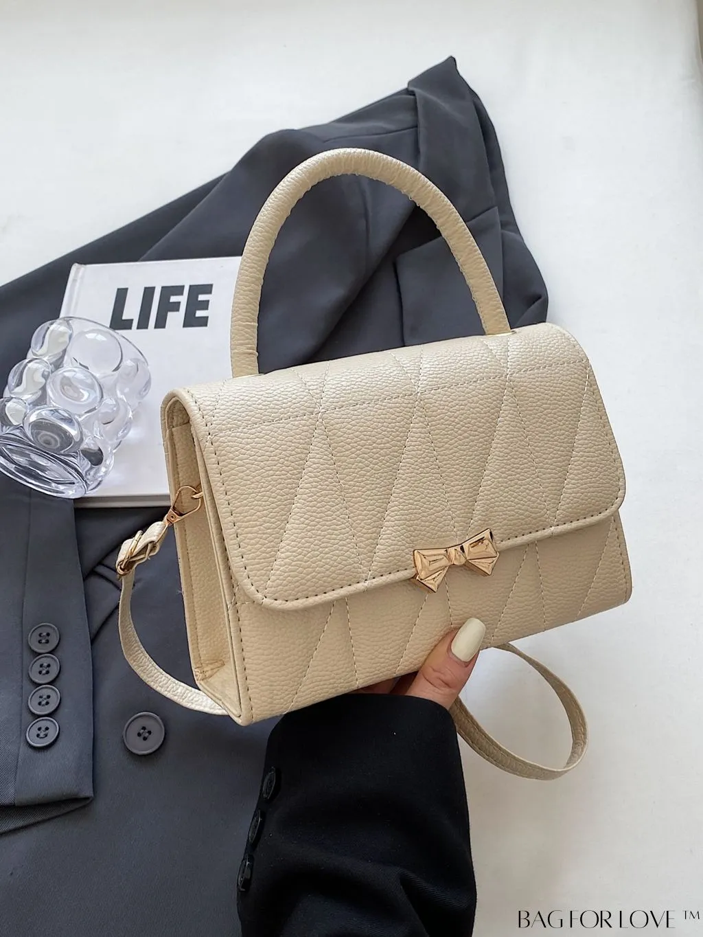 BagForLove - Chic Flap Handbag with Stylish Stitching, Bow Detail, and Adjustable Strap