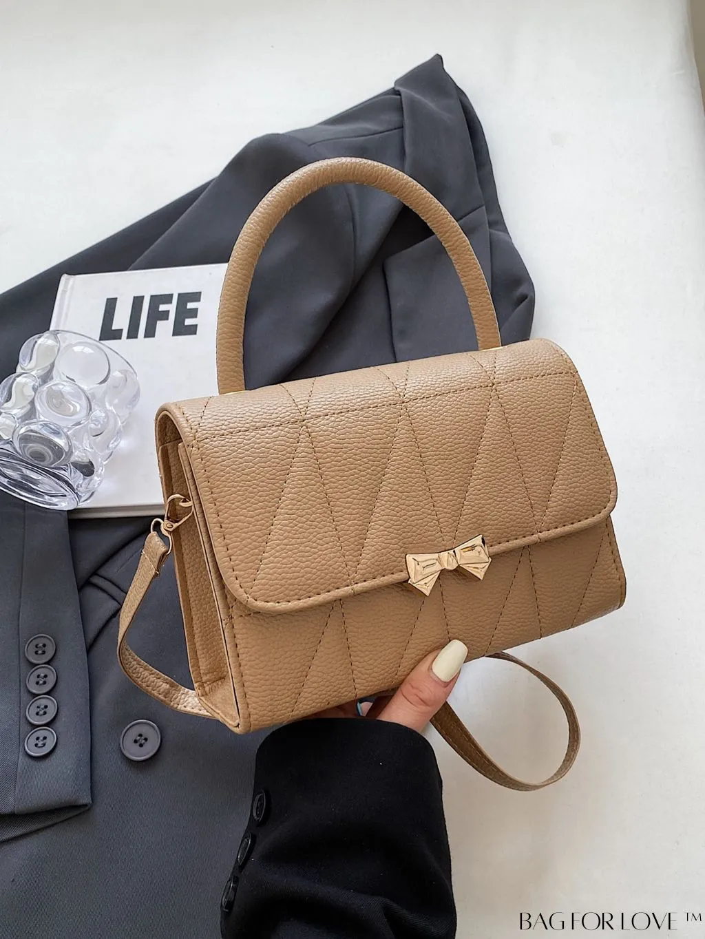 BagForLove - Chic Flap Handbag with Stylish Stitching, Bow Detail, and Adjustable Strap