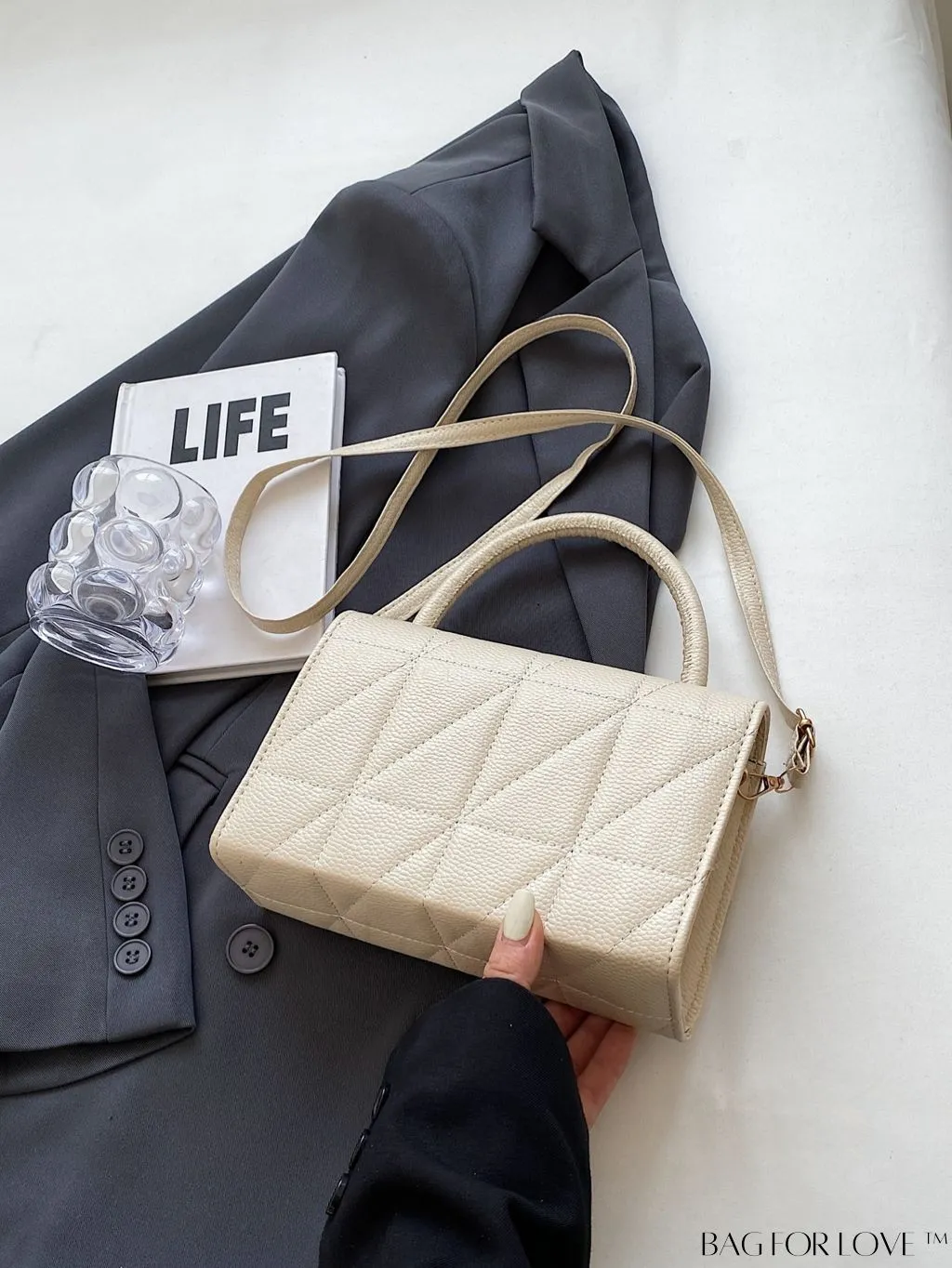 BagForLove - Chic Flap Handbag with Stylish Stitching, Bow Detail, and Adjustable Strap