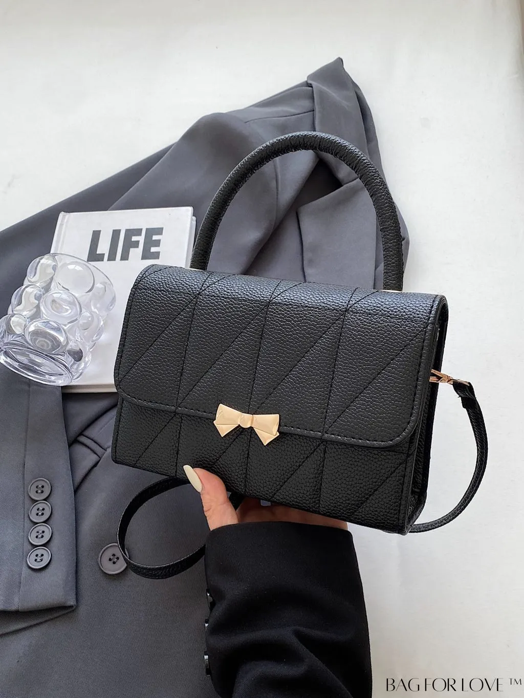 BagForLove - Chic Flap Handbag with Stylish Stitching, Bow Detail, and Adjustable Strap