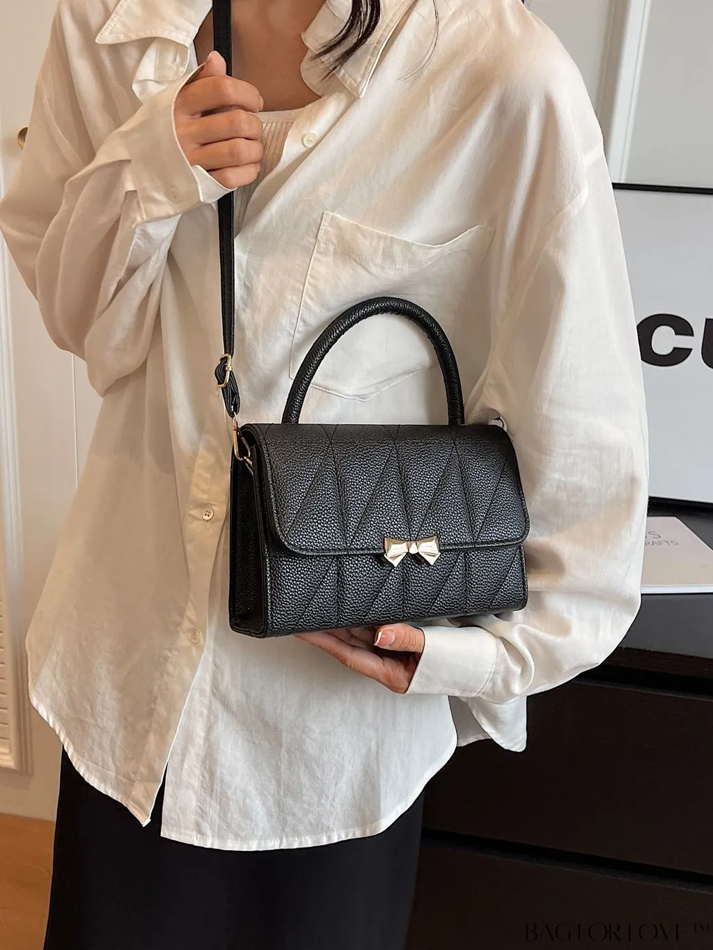 BagForLove - Chic Flap Handbag with Stylish Stitching, Bow Detail, and Adjustable Strap